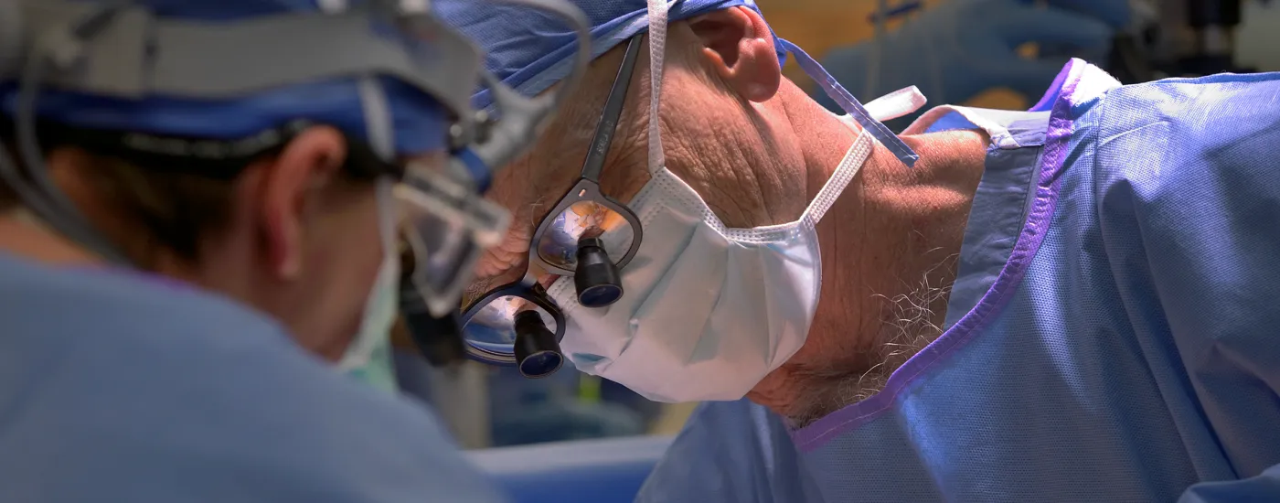 Surgery operating room. Close-up on surgeon.