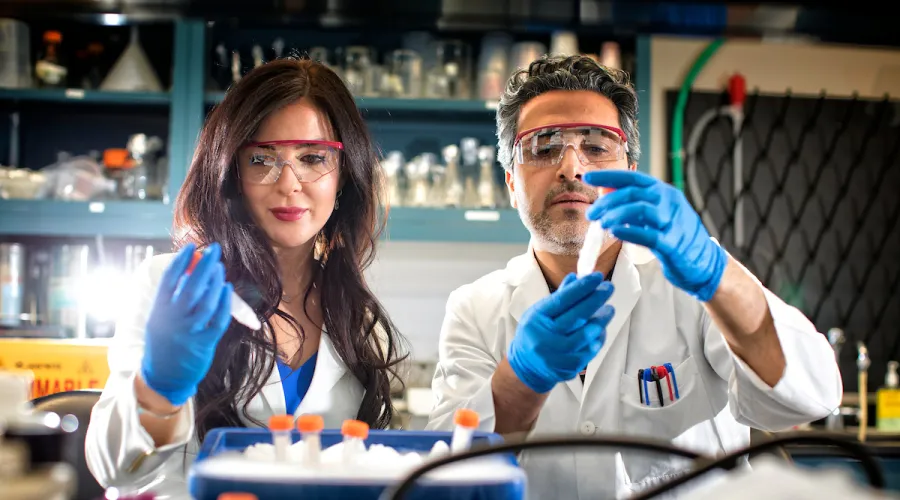 Two scientists working in the lab.