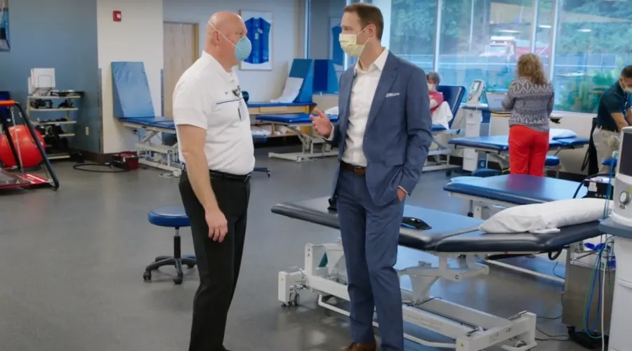 Dr. Austin Stone, another member of the sports medicine team, in a physical therapy room