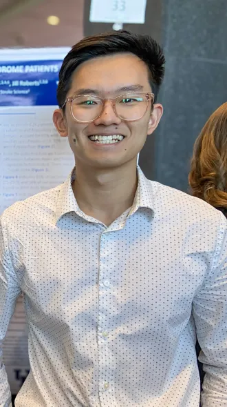 Justin Ma presents his poster